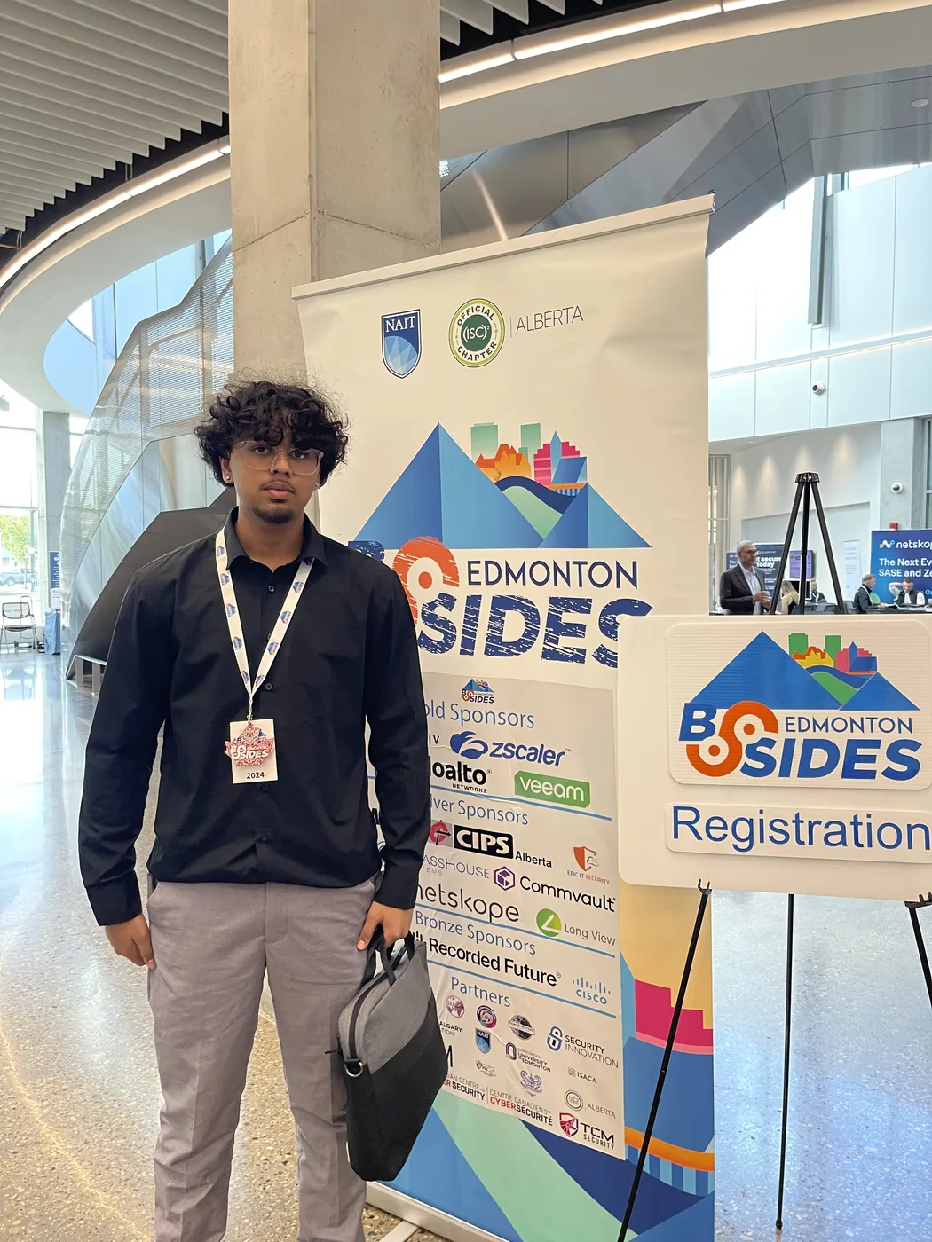 Lance Adhikari volunteering at BSides Edmonton 2025